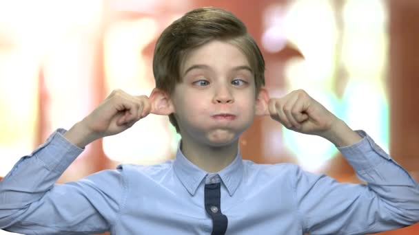 Little caucasian boy making monkey face. — Stock Video