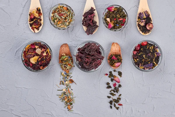 Dry tea collection on gray background. — Stock Photo, Image