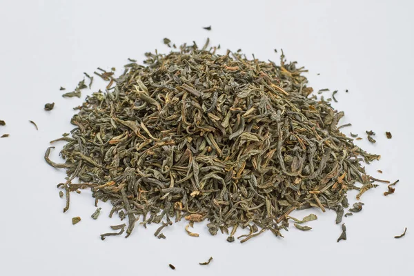 Close up heap of dried green tea leaves. — Stock Photo, Image