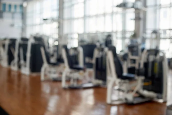 Blurred fitness gym background.