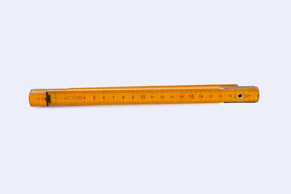 Yellow folding ruler isolated on white background. — Stock Photo, Image