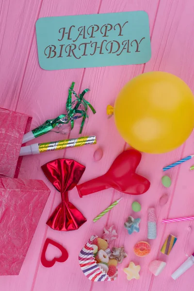 Happy Birthday background with party supplies.