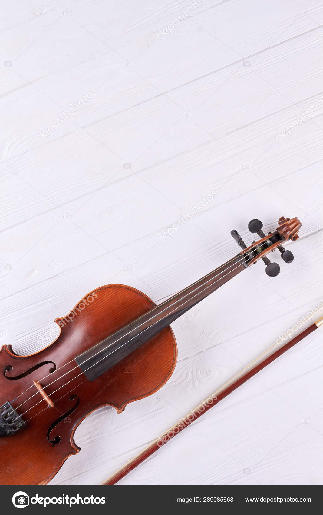 Violin, fiddle stick and copy space. — Stock Photo © Denisfilm 289085668