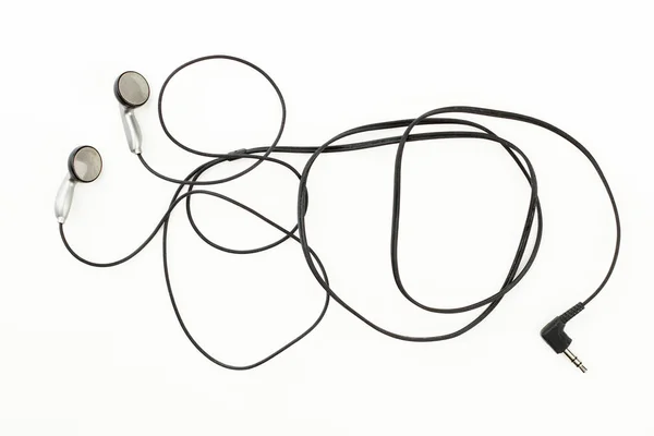 Grey earbuds over white background. — Stock Photo, Image