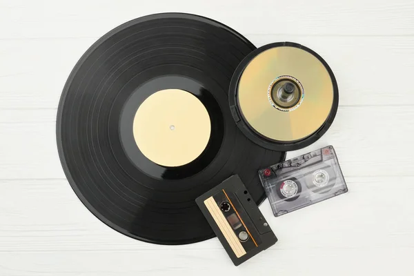 Vinyl plate, DVD discs and audio tapes. — Stock Photo, Image