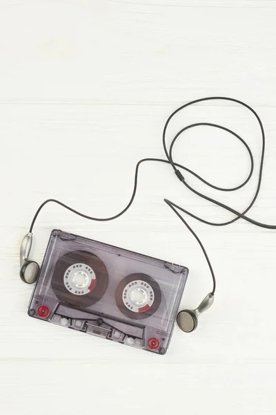 Old audio tape and earphones.