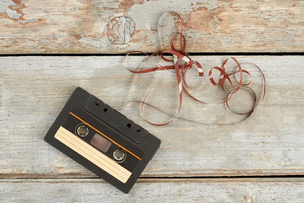 Old black audio cassette tape. — Stock Photo, Image