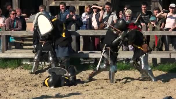 Historical restoration of knights fighting. — Stock Video
