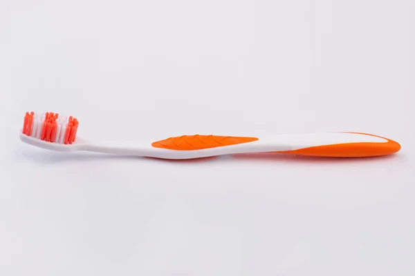 New plastic toothbrush isolated on white background. — Stock Photo, Image