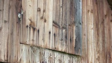 Wooden hay barn close up.