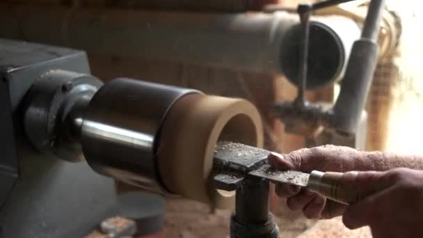 Carpenter working with equipment at his workshop. — Stock Video