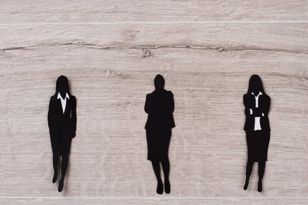 Figuras del papel negro de las mujeres de negocios . — Foto de Stock