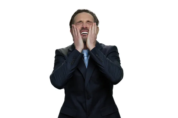 Wailing office employee in suit. — Stock Photo, Image