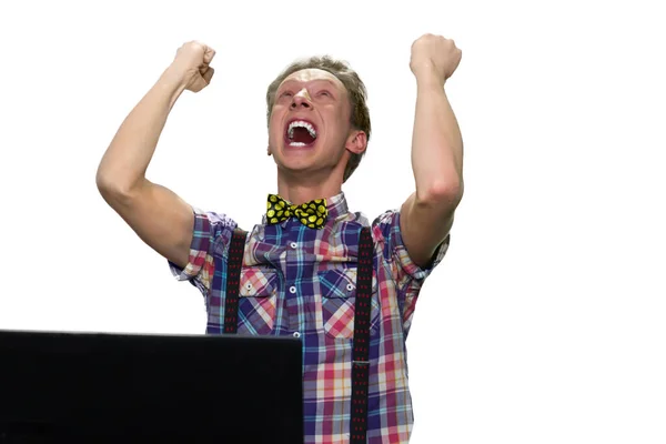 Extremely hapy teenager screaming with his hands up. — Stock Photo, Image