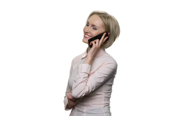 Happy blond woman is talking on phone. — Stock Photo, Image