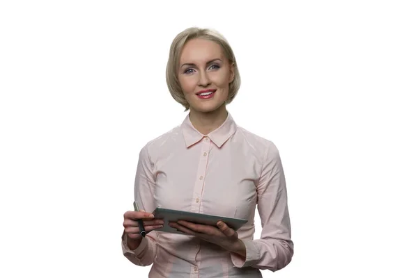 Portrait of blond white european woman holding tablet pc and pen. — Stock Photo, Image