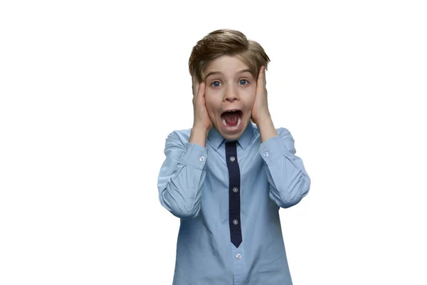 Emotional surprised boy standing with open mouth. — Stock Photo, Image