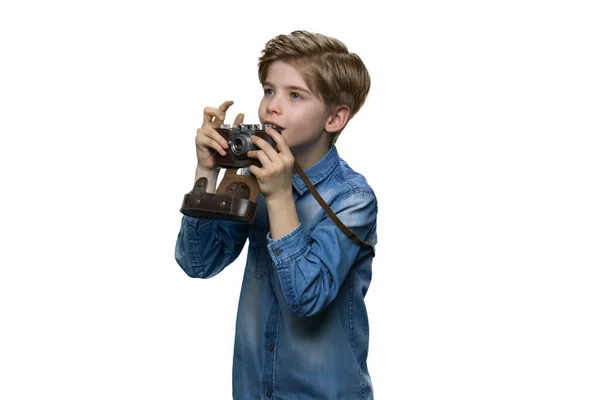 Little boy in blue denim clothes with retro camera. — Stock Photo, Image