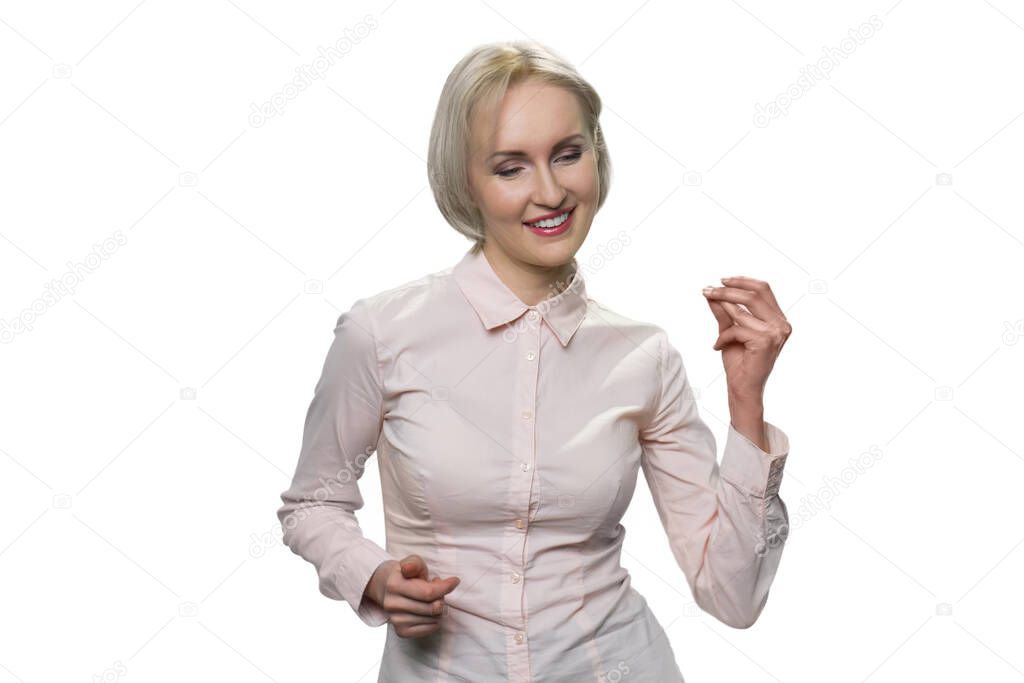 Mature businesswoman snapping her fingers.