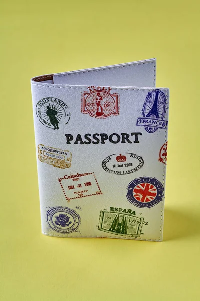 Passport cover with stylish country stamps.