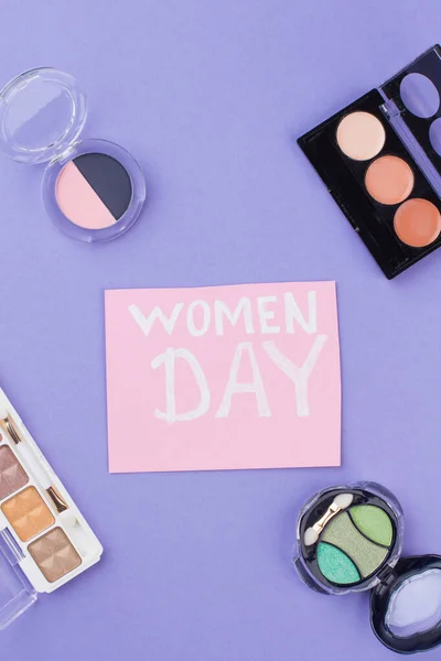 Cosmetic layout powder cases on a women day.