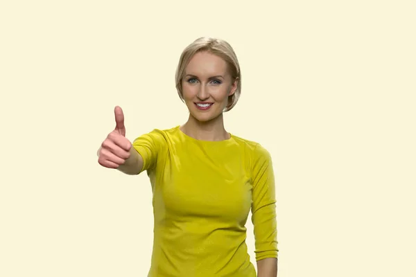 Happy blonde woman giving thumb up gesture. — Stock Photo, Image
