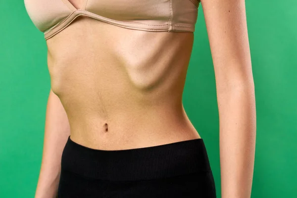 Close-up slim tight womans stomach. — Stock Photo, Image