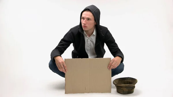 Hombre desempleado con signo de cartón en blanco. — Foto de Stock