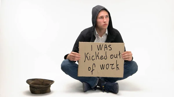 Young man was kicked out of work and begging. — Stock Photo, Image