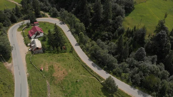 Top view lonely house near the road.