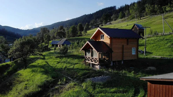 Beautiful wooden house for vacation in mountains. — Stock Photo, Image