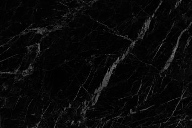 Tasarım sanat çalışmaları ve iç veya dış tasarım için kusursuz desenli yüksek çözünürlüklü siyah mermer dokusu