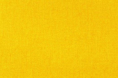 Arkaplan için sarı kumaş dokusu, doğal tekstil deseni.