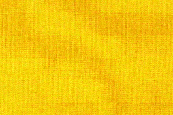 Желтая ткань текстура ткани для фона, натуральный текстильный узор.