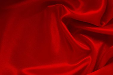 Koyu kırmızı kumaş dokusu arka plan, ipeğin veya keten deseninin ayrıntıları.