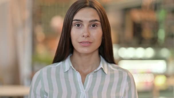 Portrait of Disappointed Young Latin Woman doing Thumbs Down — Stock Video