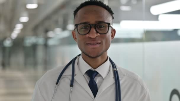 Portrait of Professional Young Male African Doctor doing Video Chat — Stok Video