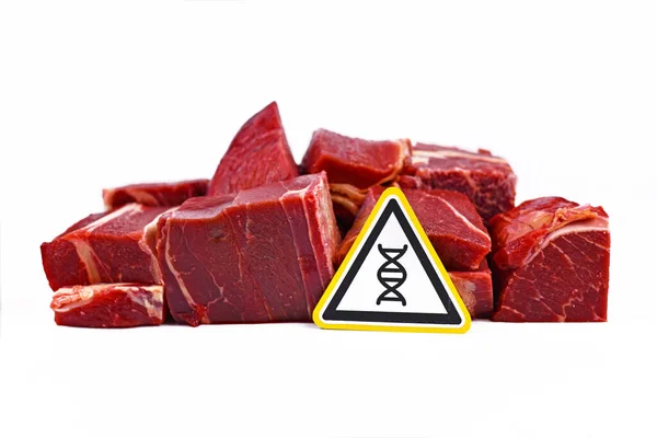 Concept for genetically modified meat for human consumption, showing chunks of red meat with yellow DNA gene warning sign