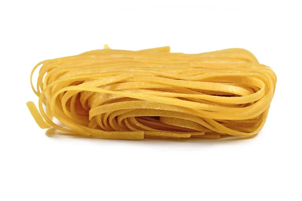 Raw Italian Tagliolini Noodles Long Ribbon Pasta Similar Spaghetti Isolated — Stock Photo, Image