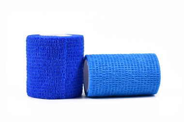 Two rolls of blue self adhesive medical elastic bandages isolated on white background clipart