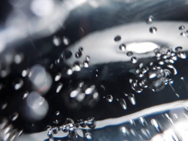 Ekoloji ve diğer başarılı projeleriniz gibi koyu mavi arka planda suda oksijen kabarcıkları oluşturur.