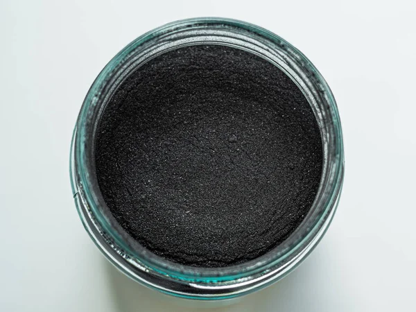 Activated Charcoal Powder Cosmetic Face Mask Jar Top View Copy — Stock Photo, Image