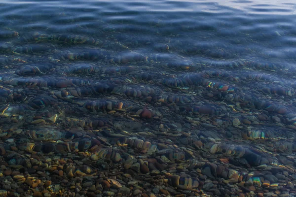 Multicolored Red Orange Yellow Colored Pebbles Clear Blue Water Lake — Stock Photo, Image