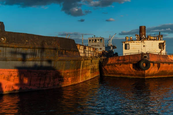 Old Rusty Red Brown Barges Sea Reflected Blue Water Sunset — Stock Photo, Image