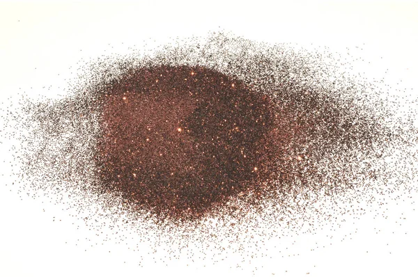 Brown glitter sparkles on white background. Beautiful abstract backdrop for vip design, fashion, make up, nail art, shopping, cards design, beauty concept