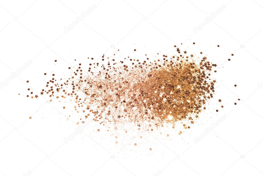 Gold glitter and glittering stars on white background in vintage colors