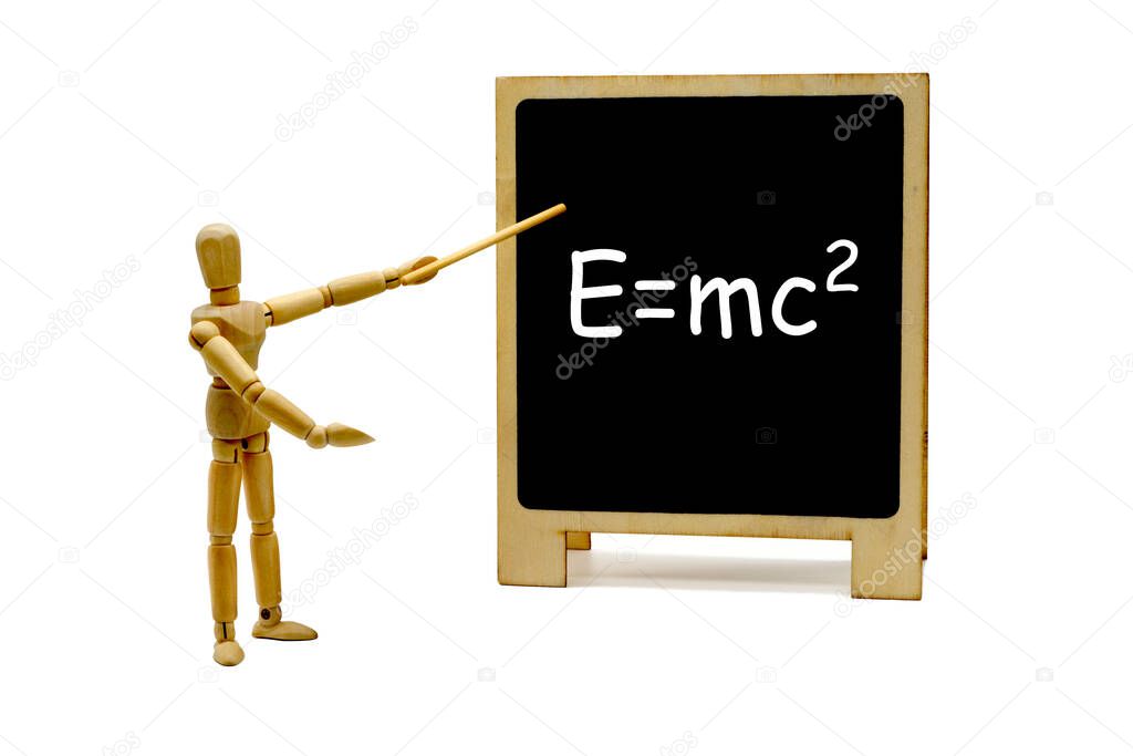 MANIKIN WITH EQUATION OF RELATIVITY E - MC2 WRITING ON BLACKBOARD. USABLE FOR SCHOOL OR UNIVERSITY OR RELATIVITY THEORY.