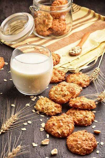 Oatmeal cookies and milk on a background with place for text. Healthy breakfast concept.