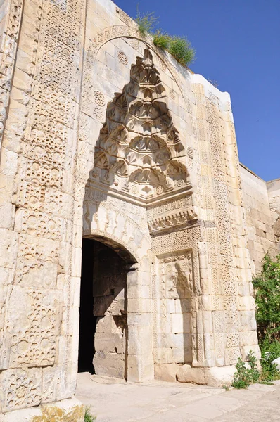 Eastern ornamental marble gate entrance or pishtaq of ancient Sultanhani Caravanserai Aksaray Turkey