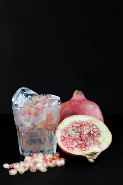 Pomegranates Glass Water Ice Black Background Copy Space — Stock Photo, Image